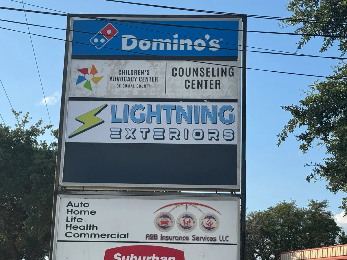 Multi-tenant pylon sign featuring Dominos and Lightning Exteriors