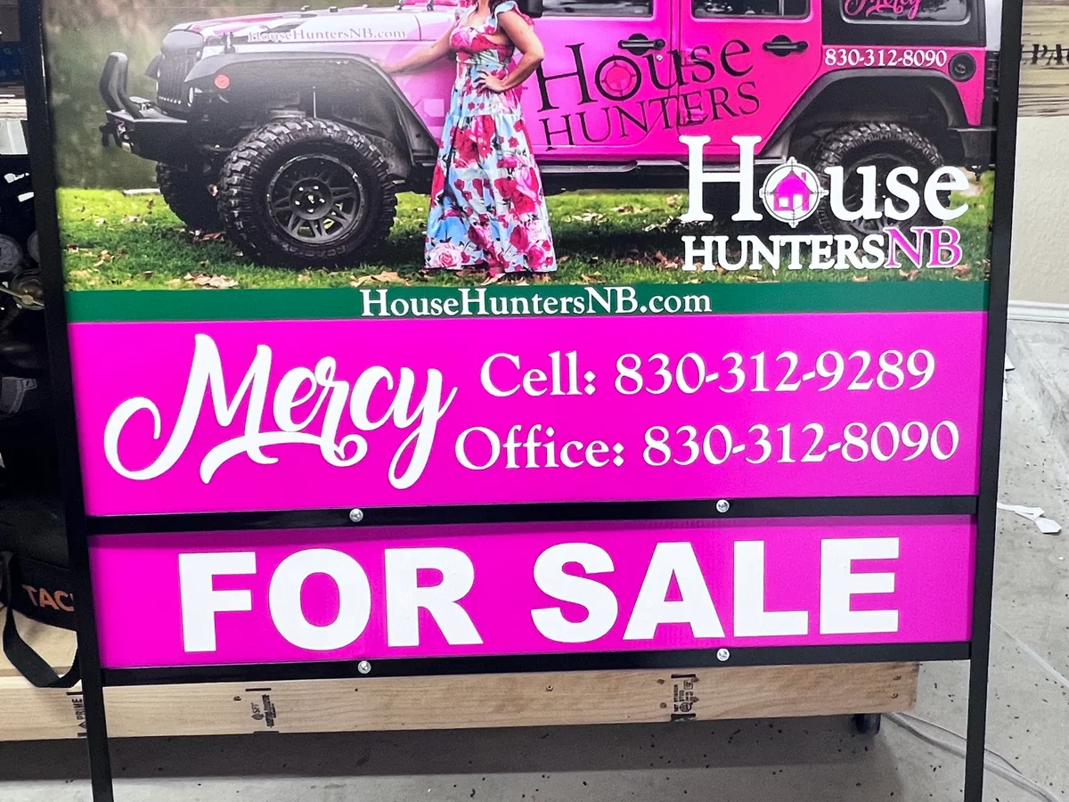 House Hunters NB FOR SALE pink real estate sign