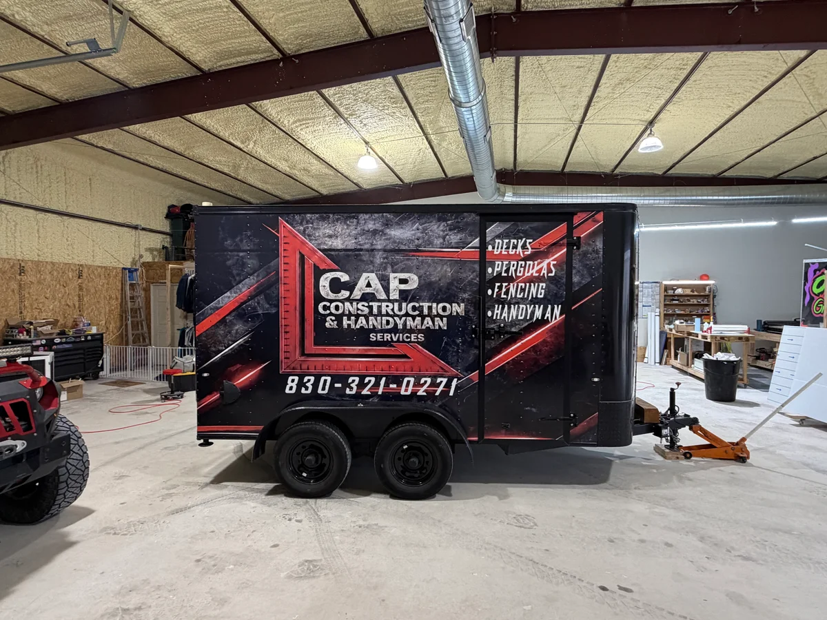 CAP Construction trailer with red diamond design